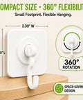 Heavy Duty Adhesive Hooks With 360 Degree Swivel Nail Free Wall Ceiling Mount Rotating Rack For Bathroom Kitchen Decor Tools No Drilling Peel Stick High Capacity Strong Support displayed on a smooth surface, illustrating compact size and 360-degree rotation.