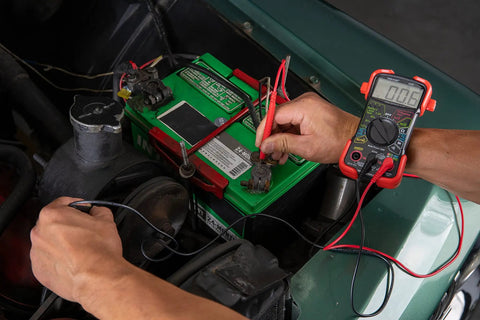 Auto-Ranging Digital Multimeter For Automotive And Home Electrical Troubleshooting UL Certified in use on car battery