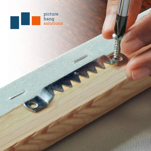 Pack Of 100 Sawtooth Picture Hangers For Frames With Screws Heavy Duty Frame Hanging Hardware Being Mounted