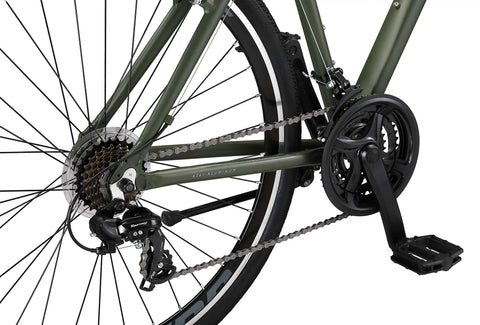 Close-up of 21-speed gearing on all-terrain go-to hybrid bike with 700c wheels 21-speed gearing aluminum frame suspension fork front and rear