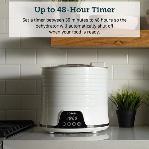 Compact Food Dehydrator With 5 Spacious Trays, Adjustable 95 To 165 Fahrenheit Temp, 48 Hour Timer on kitchen countertop.