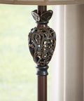 Tall Iron Lace Floor Lamp With Golden Ruby Finish, Classic Style And Ornate Scrollwork, Sculpted Finial Accent visible