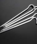 Heavy Duty Aluminum Tent Pegs Set, 12 Pack With Hooks, 7 Inch Hexagon Rod Stakes for hard ground, close-up view