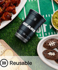 Rep Your Team With Officially Licensed Nfl Chicago Bears Aluminum Party Cups 20 Ounce Pack Of 20 Reusable Drink Vessels For Game Day Tailgating And Ice Cold Sips on a table with food.