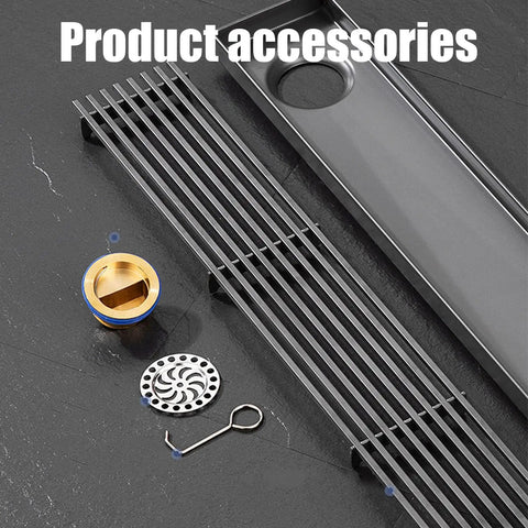 Built Different Linear Shower Drain Crafted From Heavy Duty 304 Stainless Steel With A Slick Rectangular Grate and accessories.