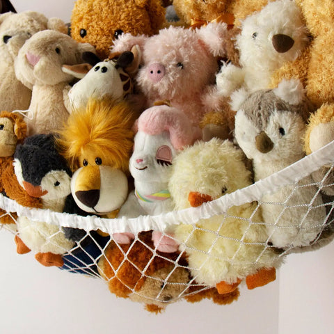 Corner Hanging Stuffed Animal Storage Hammock Net For Plush Toys Large Capacity Toy Organizer filled with various stuffed animals.