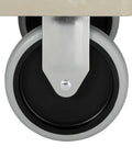 Close-up of the locking caster of Heavy Duty Two Shelf Utility Cart With Lipped Shelves And Ergonomic Handle, 500 Lb Capacity, Beige