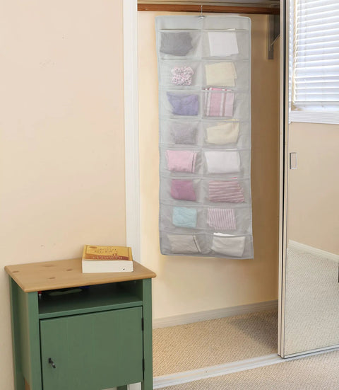 Must Have Double Sided Hanging Closet Organizer With 24 Pockets For Bras And Underwear hanging in a closet, gray mesh fabric