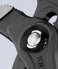 Close-up of a Quick-Adjust feature on the Three Piece Ten Inch Pliers Set With Quick Adjust Cobra Pliers On The Workpiece.