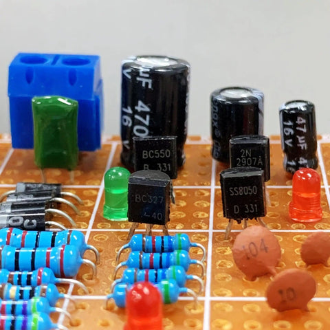Close-up of components from Power Transistor Assortment Kit With 800 Pieces Across 32 Values For DIY Projects PNP And NPN Types