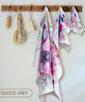 Dope Cartoon Man On Ocean Rowing Inflatable Raft Wash Cloth Towel hanging on a rack with floral pattern, quick-dry, 12x11 inches