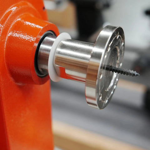 Pack Of Six Slick Anti Lock Spindle Washers Tailored For 1-1/4 Inch Woodlathe Threads on a lathe spindle with locking ring.