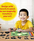 Child using Sun Paper Art Kit For Kids, STEM Craft Set With Sunlight Printing, Decorative Paper, Animal Stencils And Markers for indoor fun.