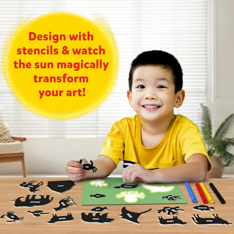 Child using Sun Paper Art Kit For Kids, STEM Craft Set With Sunlight Printing, Decorative Paper, Animal Stencils And Markers for indoor fun.