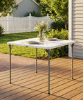 34 Inch Square Folding Table For Four With 330 Lbs Capacity Built Tough HDPE Top And Heavy Duty Steel Legs For Portable Indoor Outdoor Parties Camping White