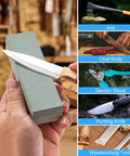 Hand using Portable Whetstone Knife Sharpener with Dual Grit 400/1000 for sharpening knife next to tools like axe and chef knife.