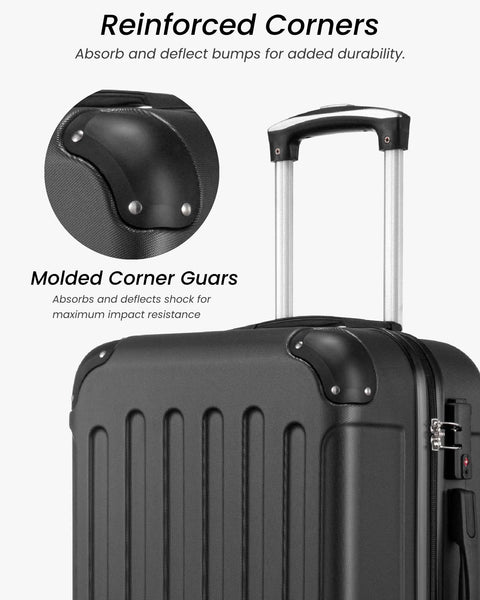 Close-up view of molded corner guards on black hardside luggage with telescoping handle.