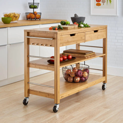 Total Kitchen Upgrade 48 Inch Bamboo Island Cart With Slick Rolling Wheels Double Drawer Units And Spacious Shelves Heavy Duty Wood Prep Table showcasing fruits and vegetables on counter.