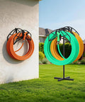 Heavy Duty Garden Hose Holder With Dual Hose Storage Holds 160 Ft Per Hose Freestanding Hose Reel Stand 90 Degree Rotatable Hook 4 Ground Spikes Outdoor Yard Lawn Sturdy Hose Organizer with dual hoses in garden.