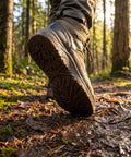 Close-up of a heavy duty work boot sole on a trail, highlighting grip, durability for outdoor use. 2 Pack Heavy Duty Rubber Sole Replacement Patches For Work Boots And Casual Sneakers Straightforward Home Do It Yourself Swap No Specialty Gear Needed To Fix Up Worn Out Kicks.