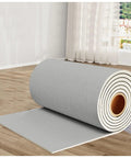 Premium 5mm Thermal Wall Panels Peel And Stick Foam Soundproof Covering in grey roll on wooden floor interior.