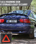 Portable All In One 5 Ton 12V Electric Car Jack Kit next to a parked car with storage case, warning sign feature visible