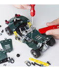 Building Roadster 5-In-1 kit with metal parts; demonstrating assembly of pull-back racer for kids, ages 8+, in STEM education.
