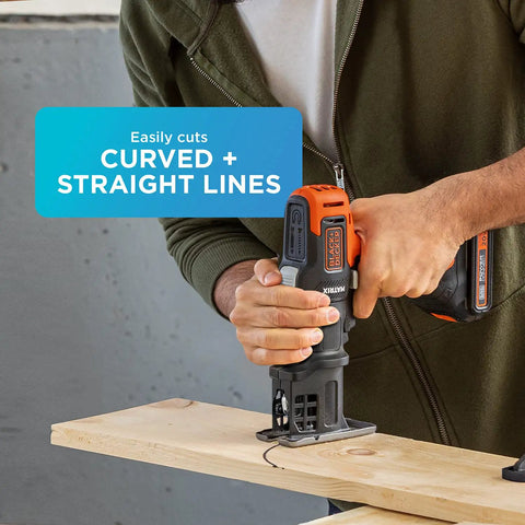 Person using Matrix Jig Saw Attachment for Cordless Drill With Tool Free Blade Change And Variable Speed Compact Design For Tight Spaces Accepts U And T Shank Blades Ideal For Precise Cuts On The Go, cutting wood