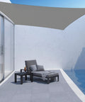Outdoor Shade Sail Rectangle 10 ft by 13 ft UV Block Canopy installed over patio by pool in graphite color.