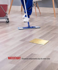 Dual Pop-Up Floor Box Kit With Brass Cover in use on laminate flooring, weatherproof and watertight, Model 962301-C