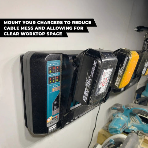 Dual Charger Wall Mount For Makita DC18RC Double Chargers 2 Pack, mounted with batteries in workshop setting.