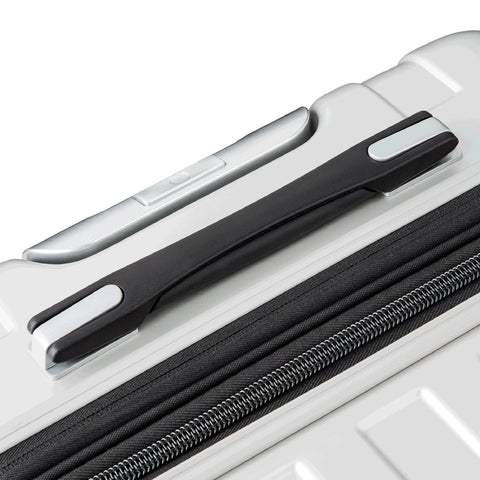 DELSEY PARIS titanium hardside luggage, silver, close-up of top carry handle and zipper