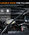Close-up of 3L Manual Transmission Fluid Transfer Pump Kit With ATF Adapters For Automotive in use with flexible hose.