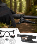 Complete Hydraulic Disc Brake Conversion Kit For Mountain Bikes With Two Ventilated Steel Rotors And Heavy Duty Metal Levers close-up of lever and handlebars.