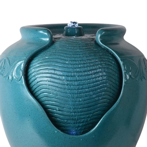 Close-up of Teal Glazed Pot Water Fountain with LED Light and Pump for Outdoor and Indoor Use, Chill Patio Garden Backyard Deck Decor, 17 Inch Height, Weatherproof Polyresin, Soothing Water Flow, showing the top water flow area.