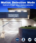Boss Outdoor Motion Sensor Flood Light 5000K Daylight LED illuminating a modern driveway with a 100-degree sensor angle.