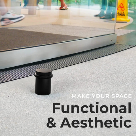Heavy Duty Solid Steel Floor Door Stopper Matte Black Wall Protector rubber bumper mounted near glass door entrance.
