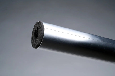 Built Tough Silver Pvc Clad Aluminum Insulation Tubes Featuring Dense Closed Cell Elastomeric Foam Core And Uv Resistant Protective Jacket For Smooth Sailing Diy Hvac Upgrades Pack Fifty Four close-up of tube end with foam core