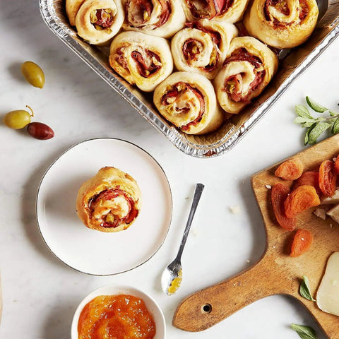Baked rolls in 35 Pack 8x8 Inch Square Baking Pans With Snap-On Plastic Dome Lids on a marble counter with apricots and marmalade