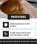 Top Shelf Wood Finish Paste Wax For Furniture Cabinets And Tabletops Blends Carnauba And Beeswax on a polished wooden surface.
