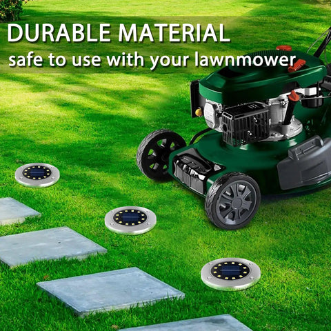 12 LED Solar Ground Lights Waterproof In Ground Disk Pathway Lights for Yard Garden Lawn Patio Walkway Pool 8 Pack shown with lawnmower
