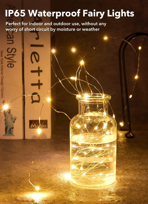 Six Pack Battery Operated Fairy Lights With Seven Foot Copper Wire 20 LED Waterproof String Lights For DIY Crafts Wedding Decor Table Centerpieces Mason Jars Party Ambiance displayed in a glass jar