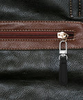 Close-up of installed black leather zipper pull from Leather Zipper Pulls Kit With Detachable Leather Handles 8 Pack Repair Tabs.