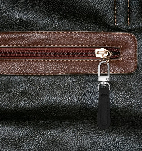 Close-up of installed black leather zipper pull from Leather Zipper Pulls Kit With Detachable Leather Handles 8 Pack Repair Tabs.