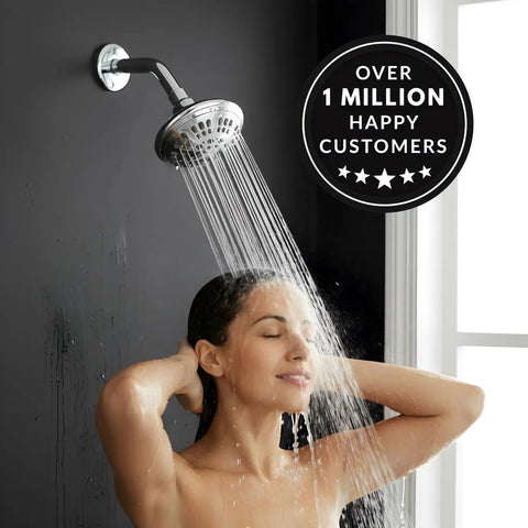 Woman enjoying shower with Six Function Luxury Shower Head With High Pressure Boost Anti Clog Nozzles, chrome finish visible