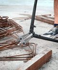 Cutting rebar with Beefy 24 Inch Bolt Cutter With Chrome Molybdenum Steel Jaws in construction site.