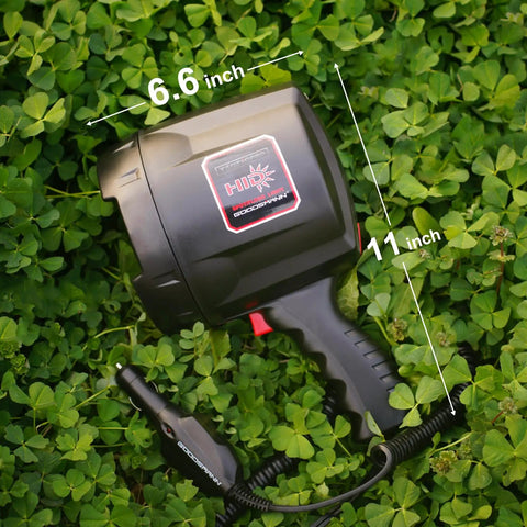 TacticPro 2000 Lumen HID Spotlight Floodlight For Auto, Garage, Boating, Outdoor events with ABS housing on grass.