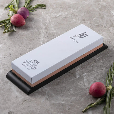 Dual Sided Knife Sharpening Whetstone With Ceramic Grit 300 And 1000 For Honing Edges, 6 Inch DM0708, on a kitchen counter