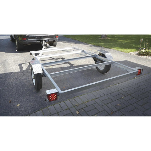Rear view of Aluminum 5x8 Utility Trailer Kit with Rustproof Frame 1715 Lb Payload and 1980 Lb GVWR attached to vehicle