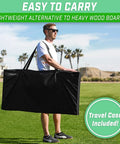 Man carrying American Flag Regulation Size Cornhole Set With 2 Regulation Boards 8 Bags Carry Case And Rules For Backyard Tailgates
